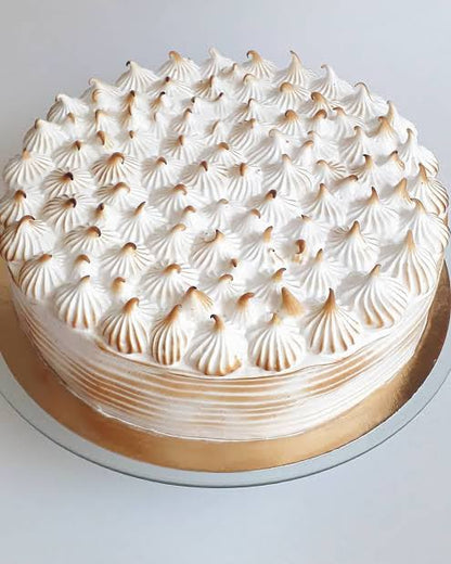 Merengue Vanilla Cake with Dulce de Leche filling